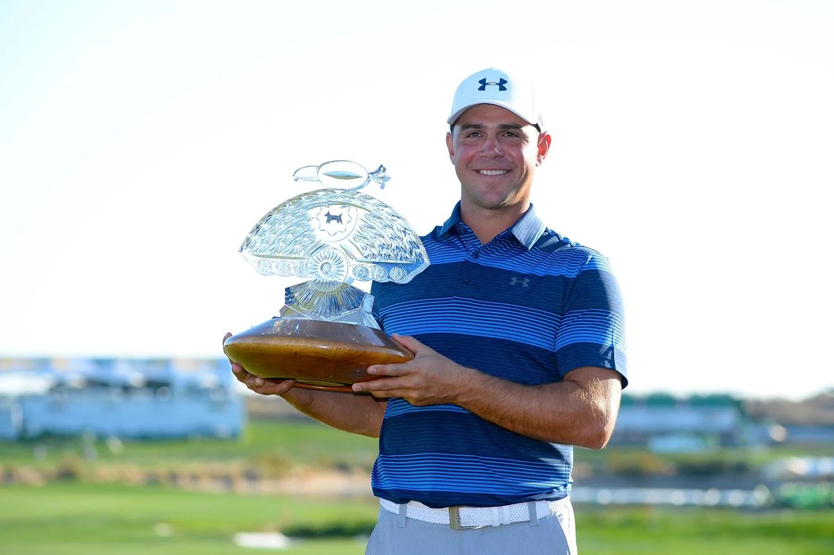 Gary Woodland wins in sudden death at Waste Management